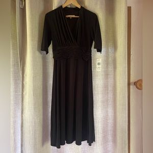Little black dress Evan-Picone.   V-neck and tea length size 10